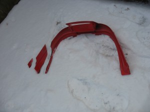 Broken Snowmobile  Fairing